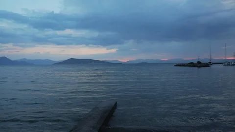 Sunset in a small bay Stock Footage 126940436