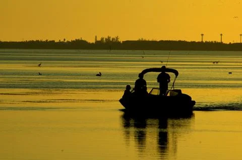 Sunset small boat Foto stock