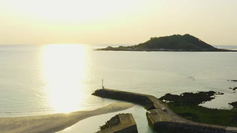 Sunset on a small island and harbor in Jeju Island. Stock Footage 195068345