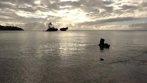 Sunset with small islands in a calm lagoon. Fiji. Stock Footage 104936076
