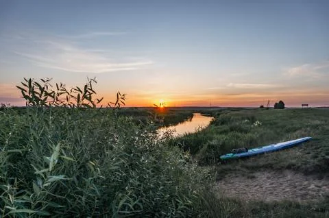 Sunset on a small river, paddle boarding on the river Losha, Foto stock