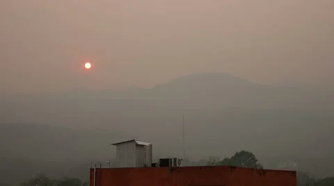 Sunset in the smoggy sky Stock Footage 48349000