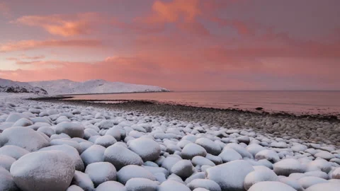 Sunset on the snow-covered shore of the Barents Sea Stock-Footage 97300165
