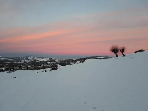Sunset in the snow Stock Photos