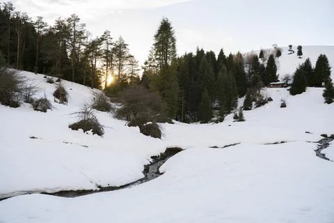 Sunset in a snowy mountain in winter, in the Basque Country, Spain Stock Photos