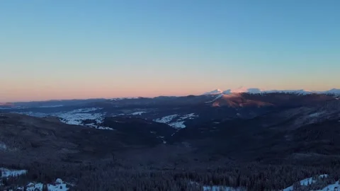 Sunset in the snowy winter mountains Stock Footage 264985805