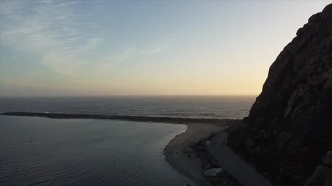 Sunset Soar: Drone Imagery of Morro Rock at Dusk - 3 Stock Footage 265067831
