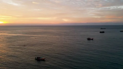 Sunset Soaring: Drone Flight over the Sea 2 Stock Footage 240879141