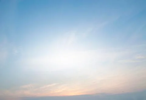 Sunset with soft blue sky background  Stock Photos