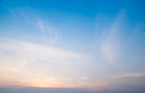 Sunset with soft blue sky background  Stock Photos