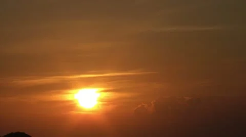 Sunset with some clouds Stockbeeldmateriaal 21493396