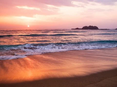 Sunset in a spanish beach Stock Photos