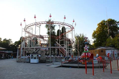 Sunset Spectacle: Amusement Park Magic Stock Photos