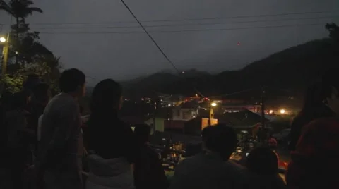 Sunset - spectators watch Taipei lanterns fly up - Pingxi Stock Footage 47285285
