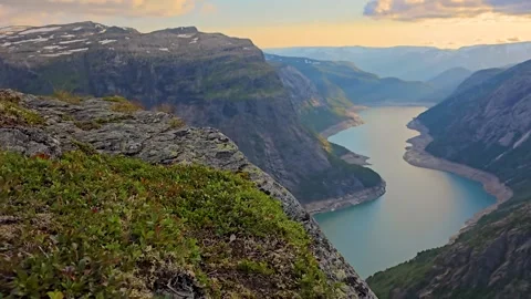 Sunset Splendor: Clouds and Views Over Ringdalsvatnet Stock Footage 282398490