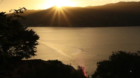 Sunset with a Stand Up Paddle rider. Video stock 38684791