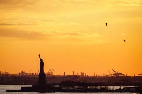Sunset on the statue of Liberty Stock Photos