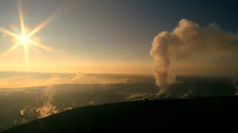 Sunset With Steam from a Volcanic Crater Stock Footage 628896