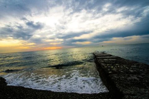 Sunset on a stone pier. Foto stock