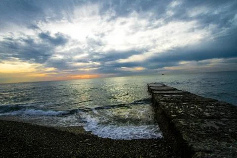 Sunset on a stone pier. Foto stock