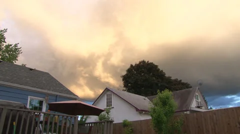 Sunset Storm Clouds Over Homes Stock-Footage 38661436