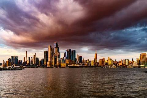 Sunset Storm Clouds over Midtown New York City from Hoboken, NJ, May 2023 Stock Photos