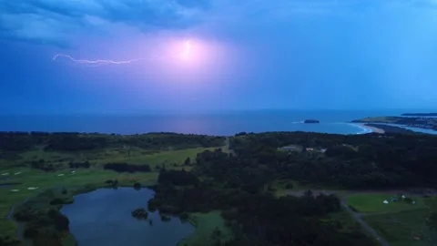 Sunset Storm Over Ocean with Lightning Strikes Stock Footage 331614519