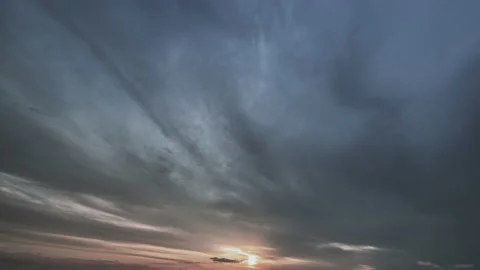 Sunset with stormy clouds flow Stock Footage 160338760