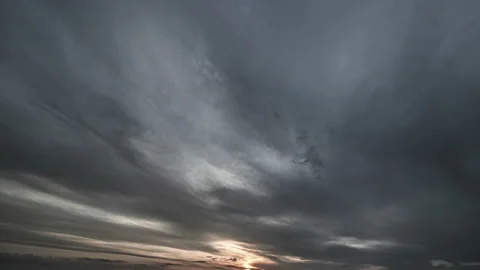Sunset with stormy clouds flow Stock Footage 160338802