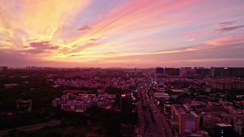 Sunset with streaks of orange color in sky at rai durgam hyderabad with Stock Footage 254096579