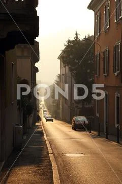 Sunset in streets of Como Stock Photos