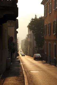 Sunset in streets of Como Stock Photos