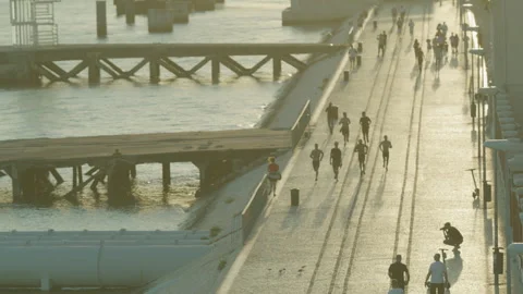 Sunset Stroll Along the Waterfront Promenade Near MAAT in Lisbon3 Stock Footage 273775203