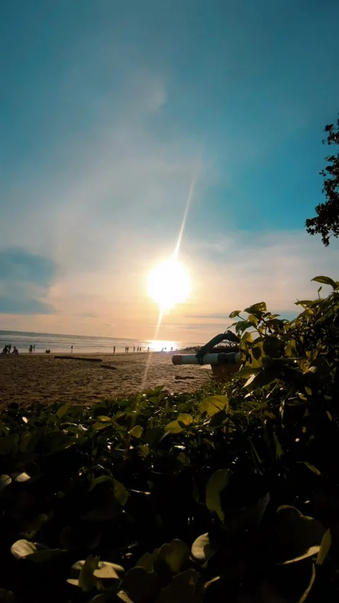Sunset strolls by the beach - Enjoying nature's beauty. Stock Footage 237937485