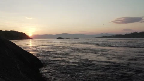 Sunset at strong tidal current Saltstraumen in Norway Video stock 238474566