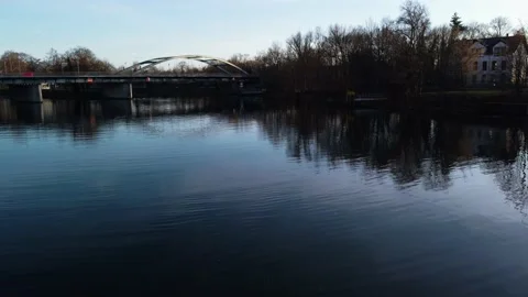 Sunset in the suburbs of Germany. Drone. River in the city. Boats in the water. Stock Footage 231785516