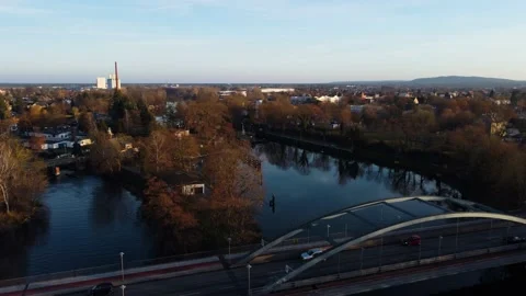 Sunset in the suburbs of Germany. Drone. River in the city. Boats in the water. Stock Footage 231785561