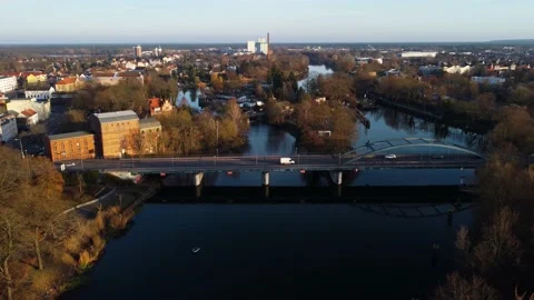Sunset in the suburbs of Germany. Drone. River in the city. Boats in the water. Stock Footage 231785729