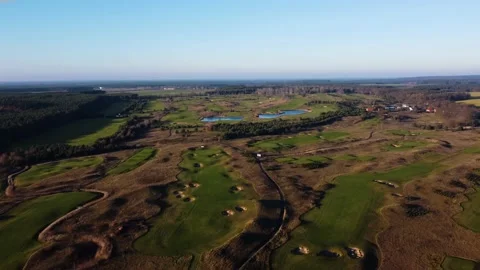 Sunset in the suburbs of Germany. Golf courses from above. Drone. Stock Footage 231785840