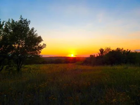 Sunset on a summer evening with red sky Foto stock