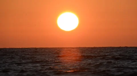 Sunset of a sun above Mediterranean Stockbeeldmateriaal 52751401