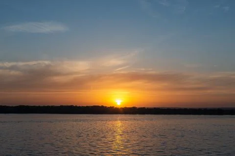 Sunset sun across the river Stock Photos
