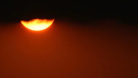 Sunset sun appear from dense cloudscape Stock-Footage 123702911
