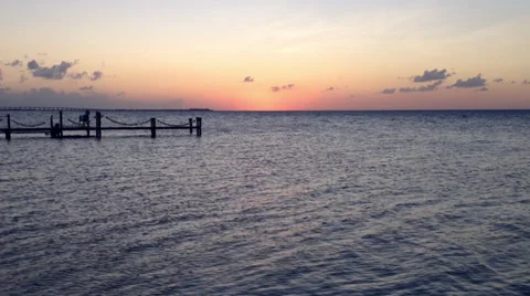 Sunset - Sun disappearing in the ocean Stock Footage 32772256