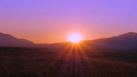 Sunset. The sun is on the horizon. Sun rays. Stock Footage 79108784
