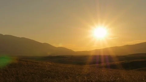 Sunset. The sun is on the horizon. Sun rays. Stock Footage 79112108