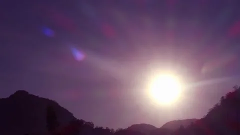 Sunset with sun light ray n spectrum bokeh lens flare or sunbeam over mountain Stock Footage 149393525