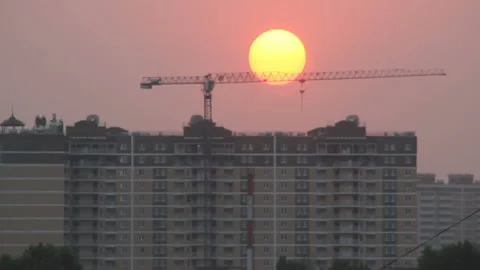Sunset sun over building Stock Footage 125135612
