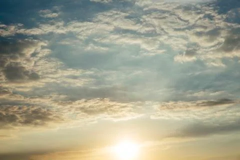 Sunset with sun rays and clouds Stock Photos