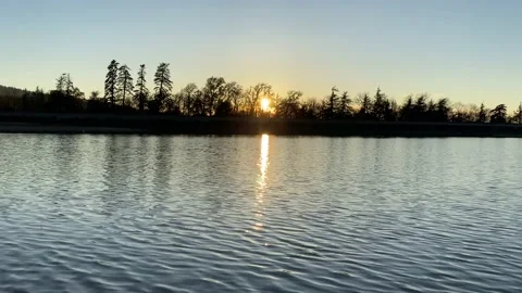 Sunset - Sun Reflecting in the Lake Stock Footage 150428644